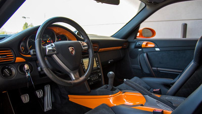 Black Alcantara - Orange StitchingInterior image