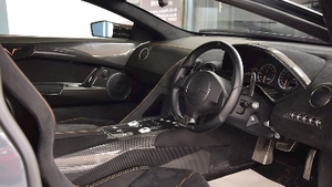 Nero Alcantara - Arancio Leonis Stitching & PipingInterior image