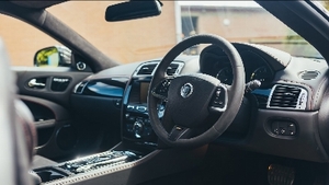 Warm Charcoal Leather / Jet Suedecloth - Red Stitching / PipingInterior image