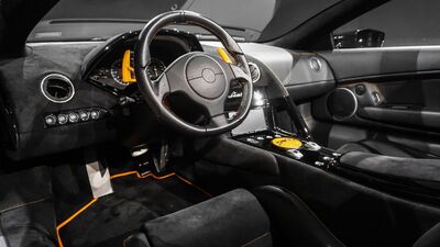 Nero Perseus Leather / Alcantara - Arancio Leonis StitchingInterior image