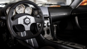 Black Leather - Orange StitchingInterior image