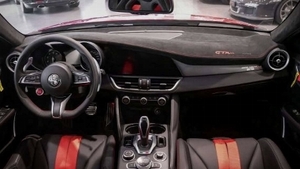 Black Alcantara - White StitchingInterior image