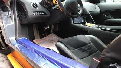 Nero Perseus Leather / Alcantara - Arancio Leonis StitchingInterior image