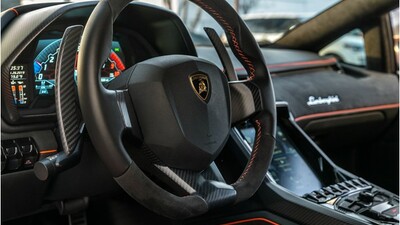 Black Alcantara - Orange PipingInterior image