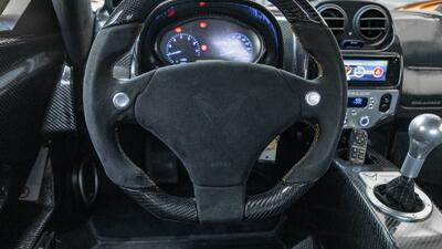 Black Alcantara - Orange StitchingInterior image