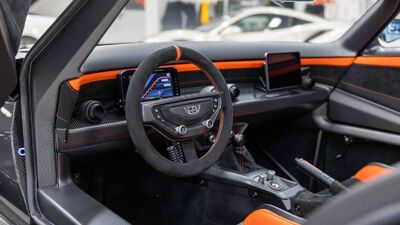 Black Alcantara / Orange Leather - Orange StitchingInterior image