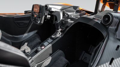 Black Alcantara - Orange StitchingInterior image