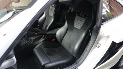 Black Alcantara - White StitchingInterior image