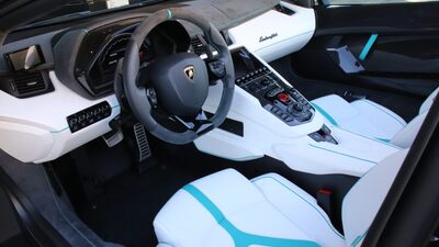 Bianco Leather / Nero Cosmus Alcantara - Blu Uranus Inserts - Blu Uranus / Oro Stitching / PipingInterior image